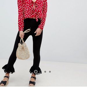 ASOS ruffle hem leggings with Pom poms